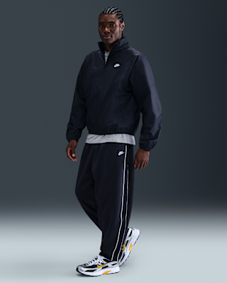 Nike Sportswear Club Men's Oversized Knit Tracksuit Bottoms. Nike SI